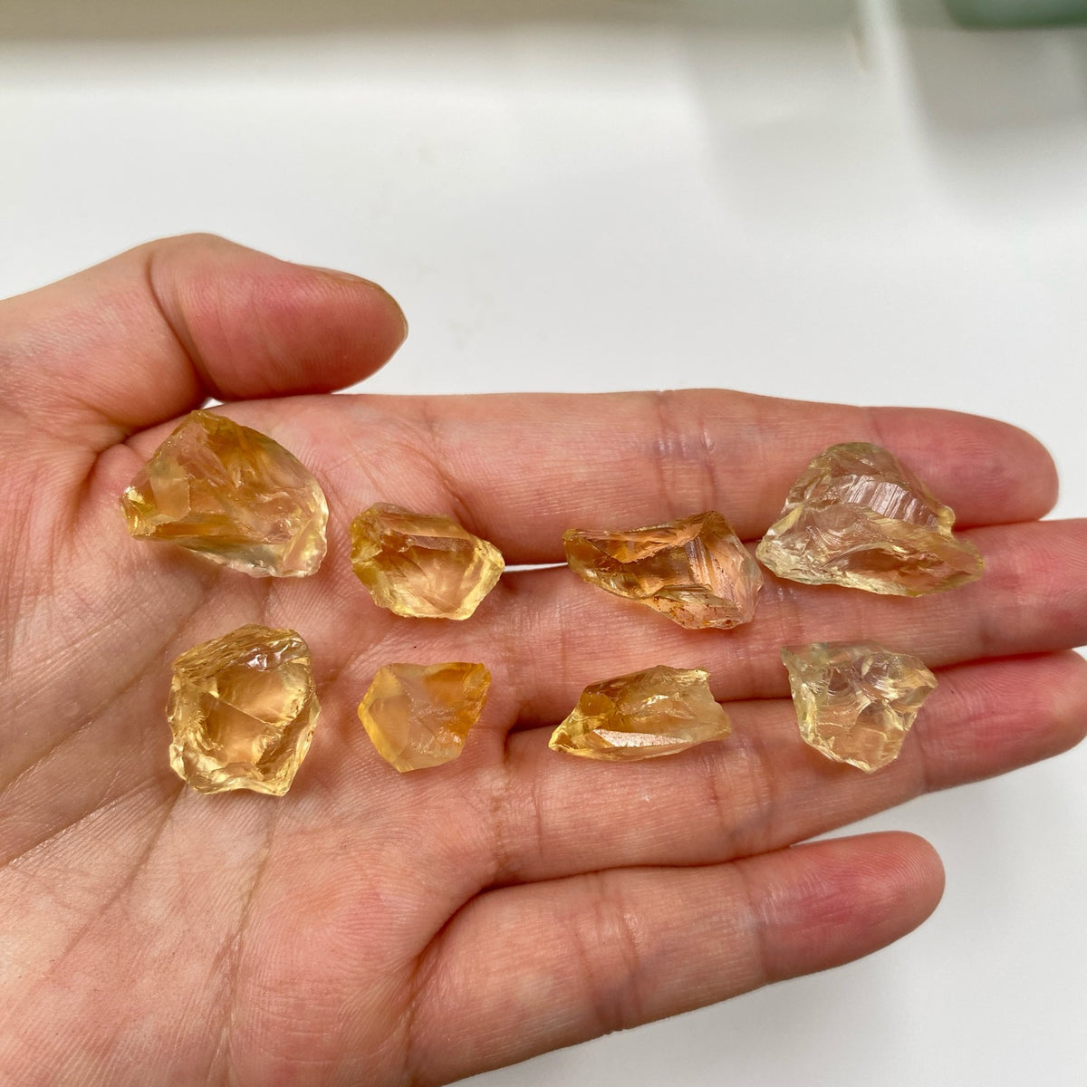 Deep Lemon Yellow AAA citrine raw rough pieces in hand