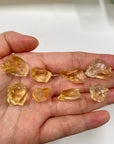Deep Lemon Yellow AAA citrine raw rough pieces in hand
