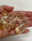 Light Lemon Yellow AAA citrine raw rough pieces in hand