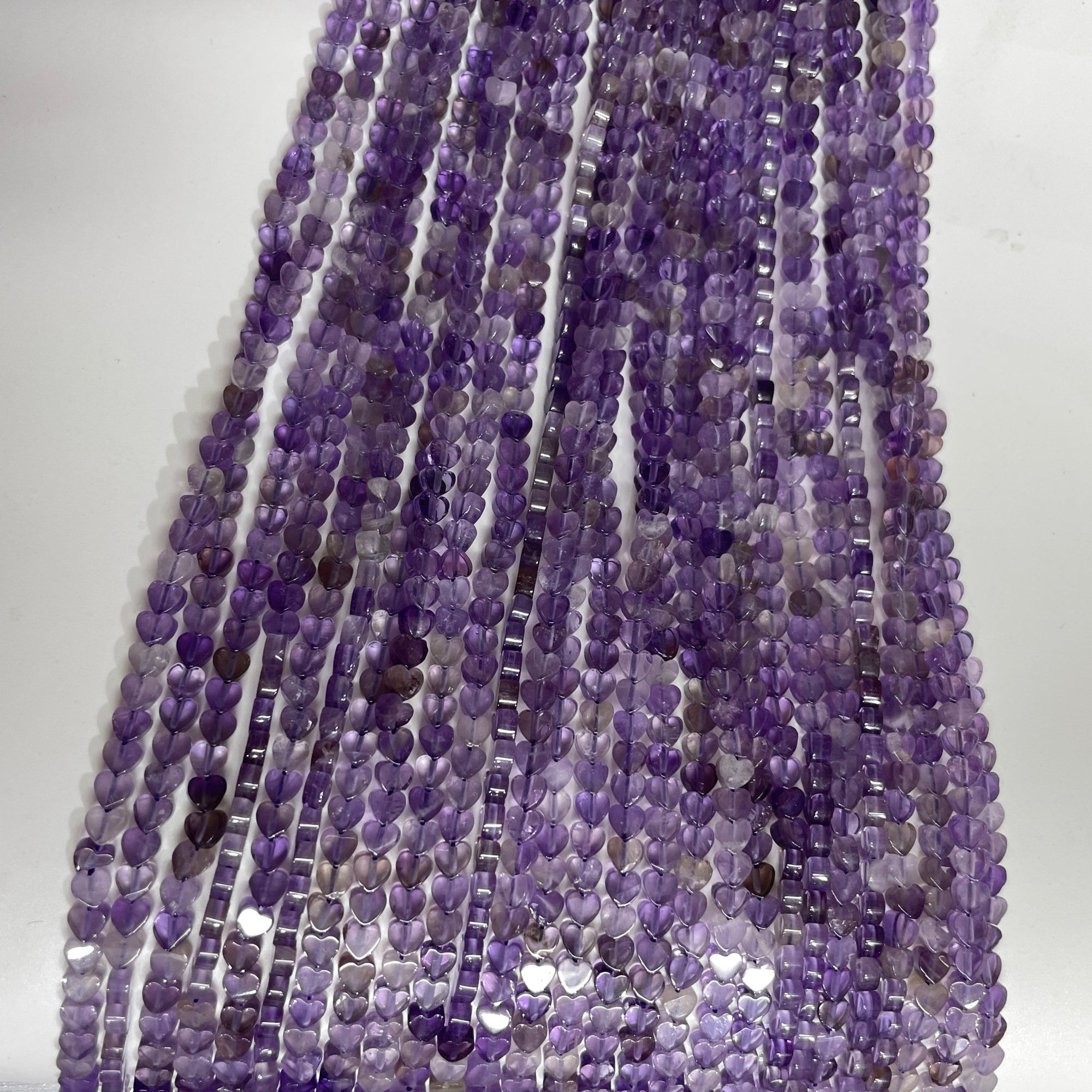 Amethyst Double-Sided Flat Heart Shaped Bead Strand - RockZ Sourcing Hub