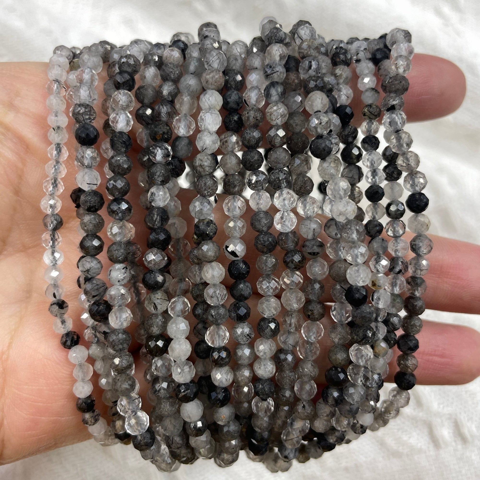 Black Rutilated Quartz Faceted Bead Stretch Bracelet - RockZ Sourcing Hub