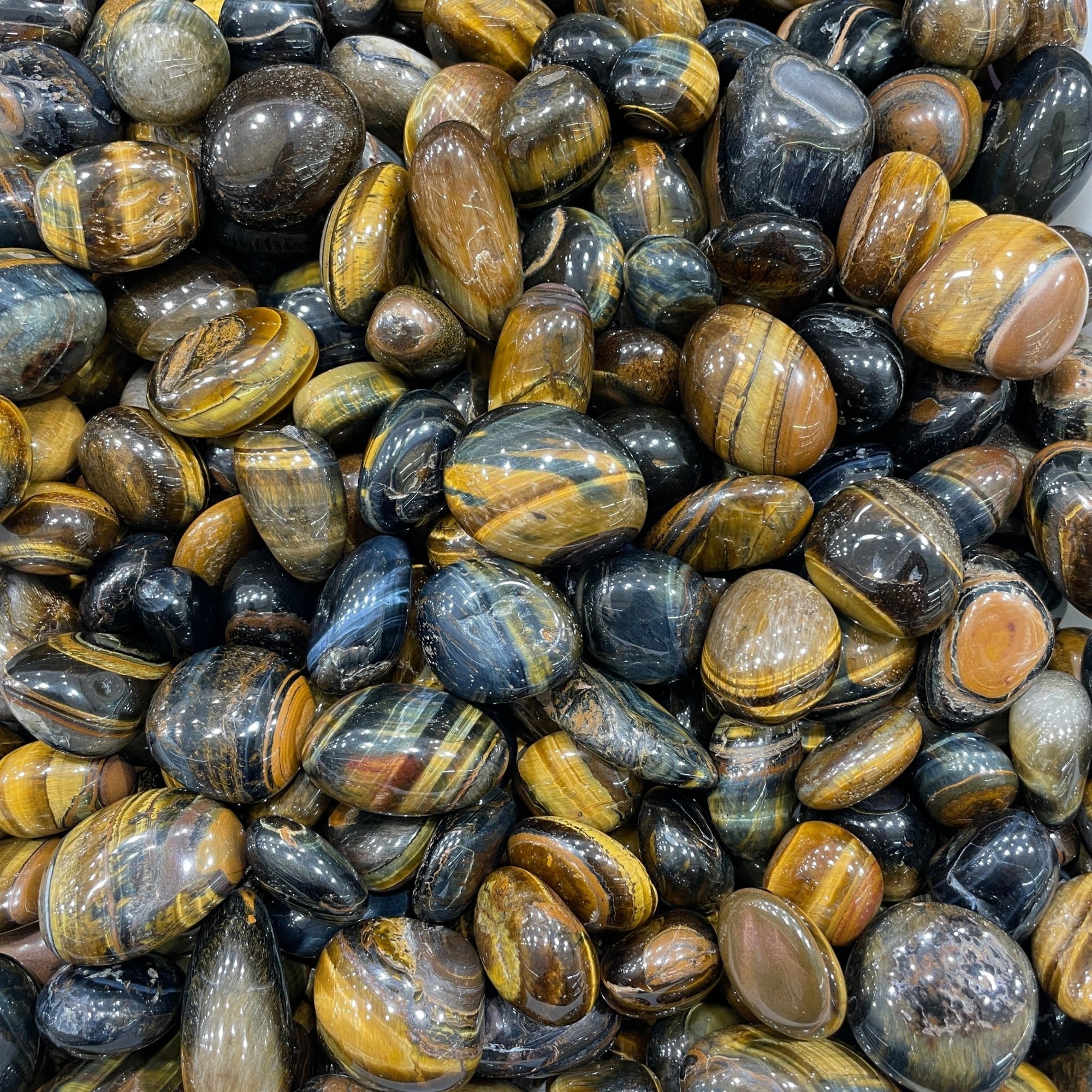 Blue & Yellow Tiger’s Eye Tumblestone - RockZ Sourcing Hub