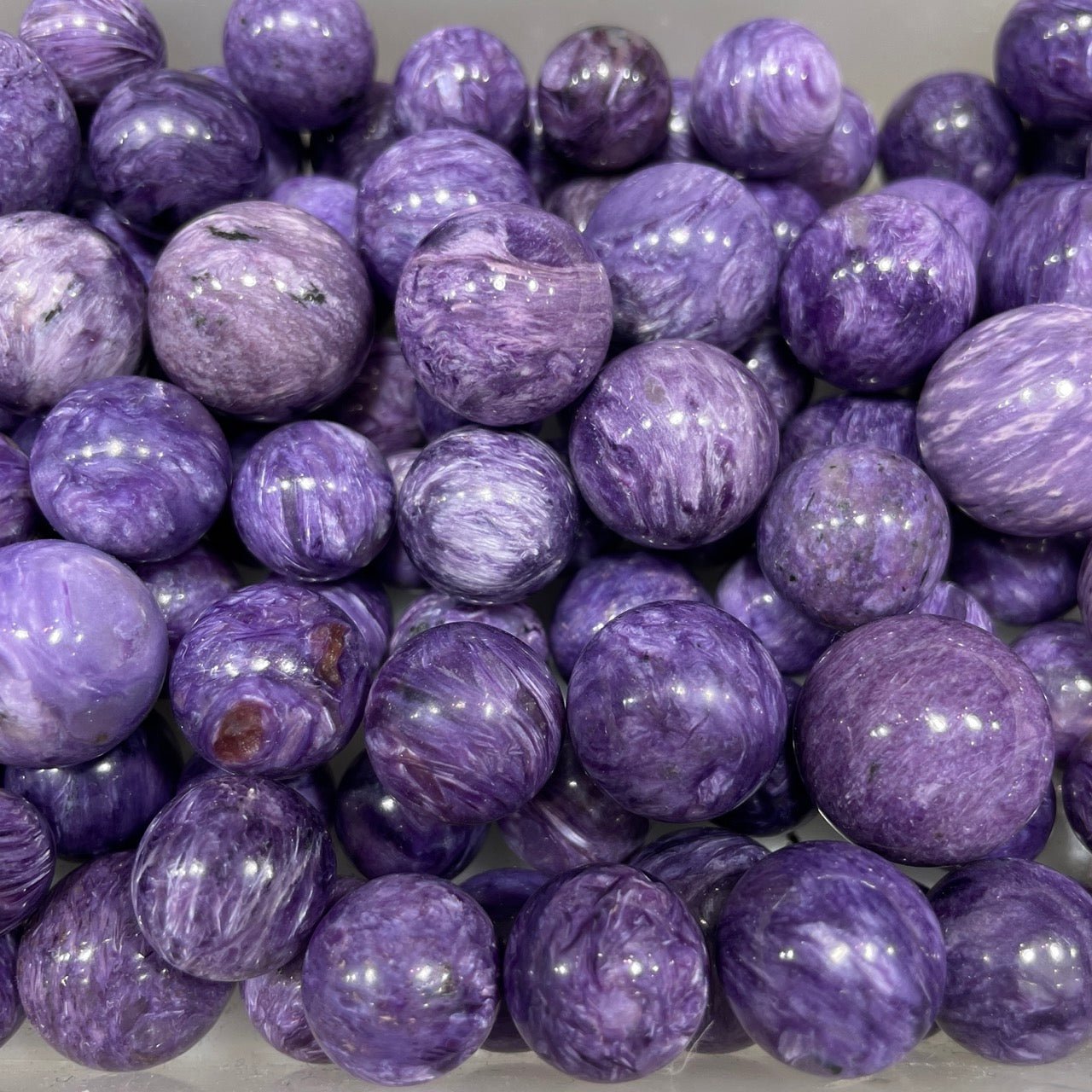 Charoite Sphere - Grade AAA - RockZ Sourcing Hub