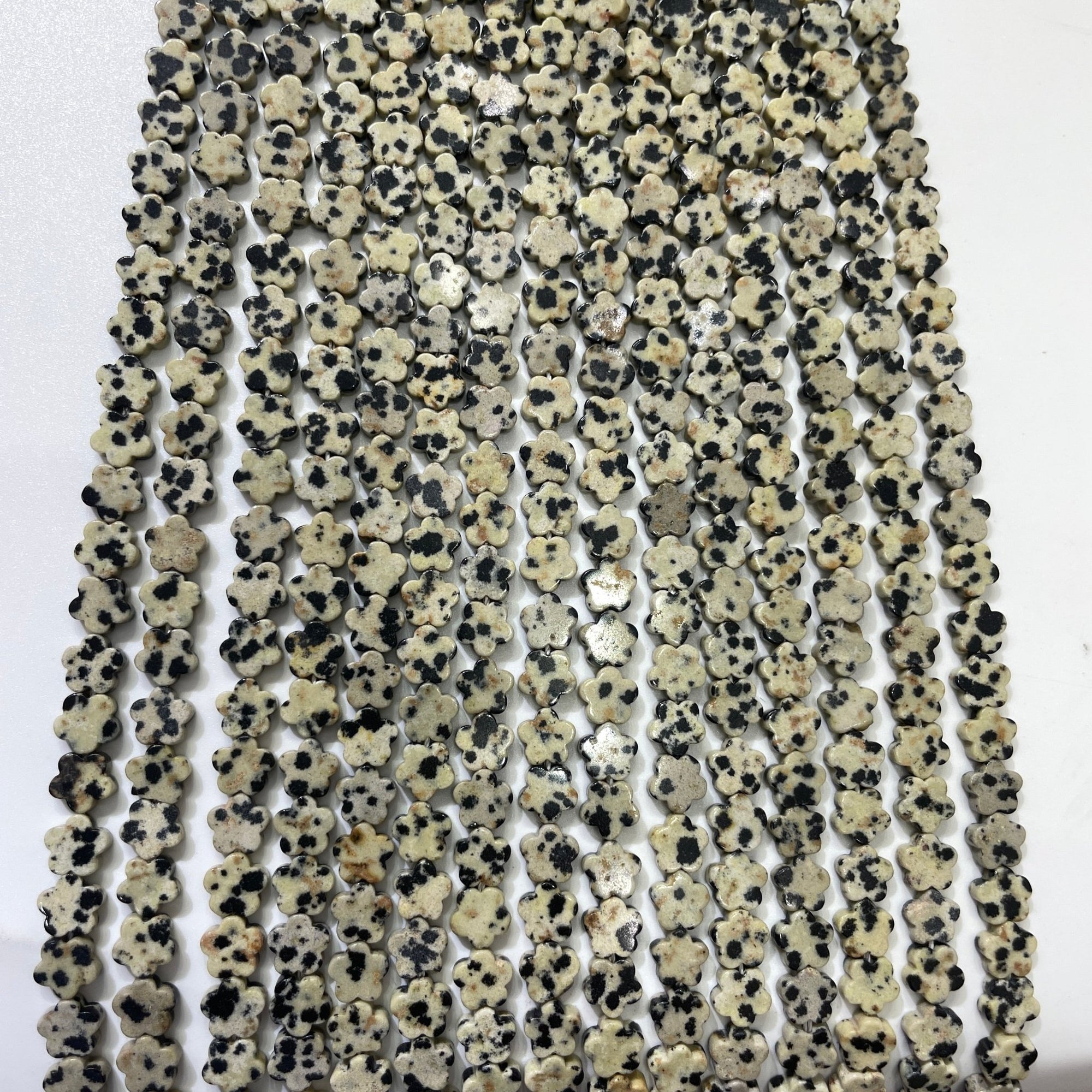 Dalmatian Jasper Double-Sided Flat Flower Shaped Bead Strand - RockZ Sourcing Hub
