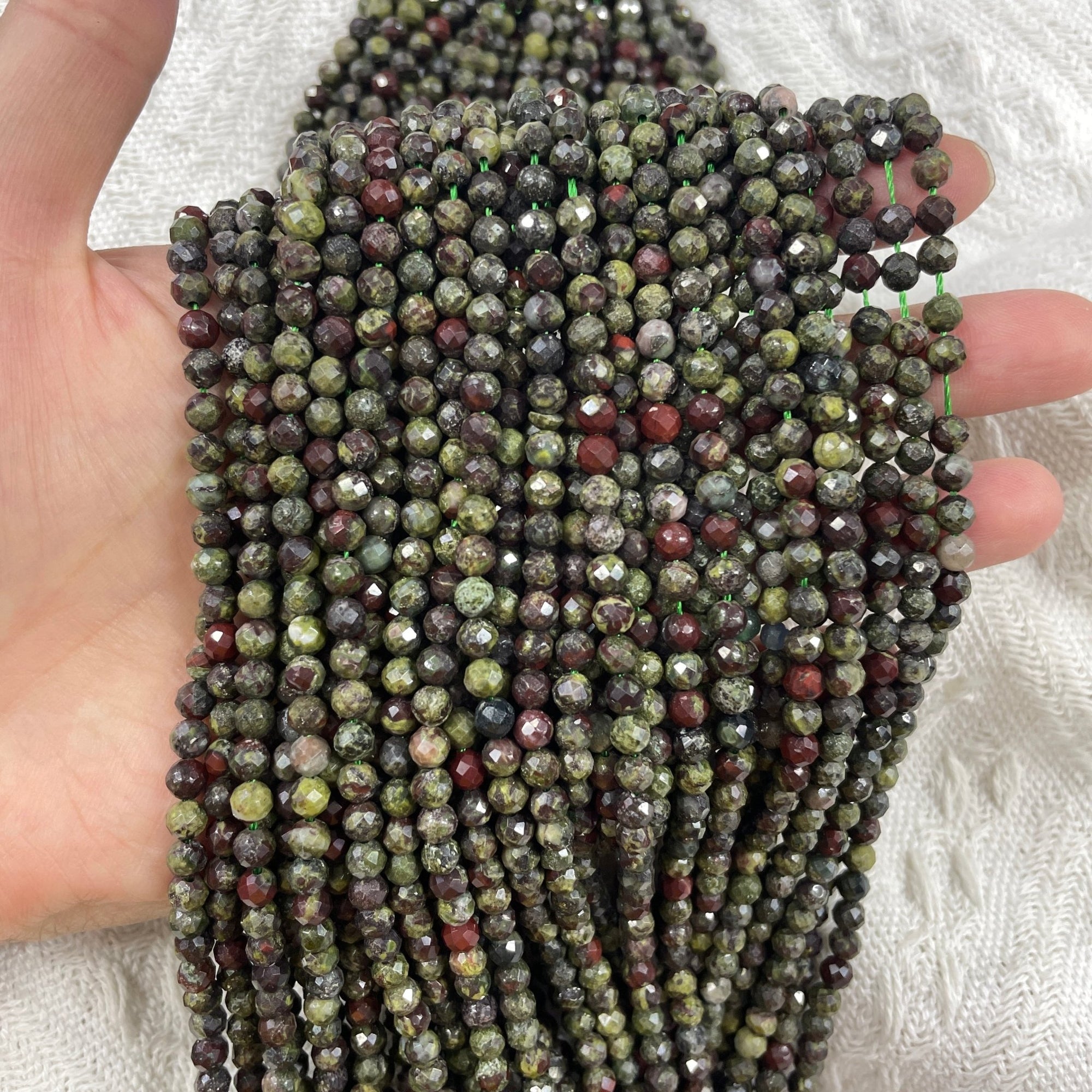 Dragon Blood Stone Faceted Bead Strand - RockZ Sourcing Hub