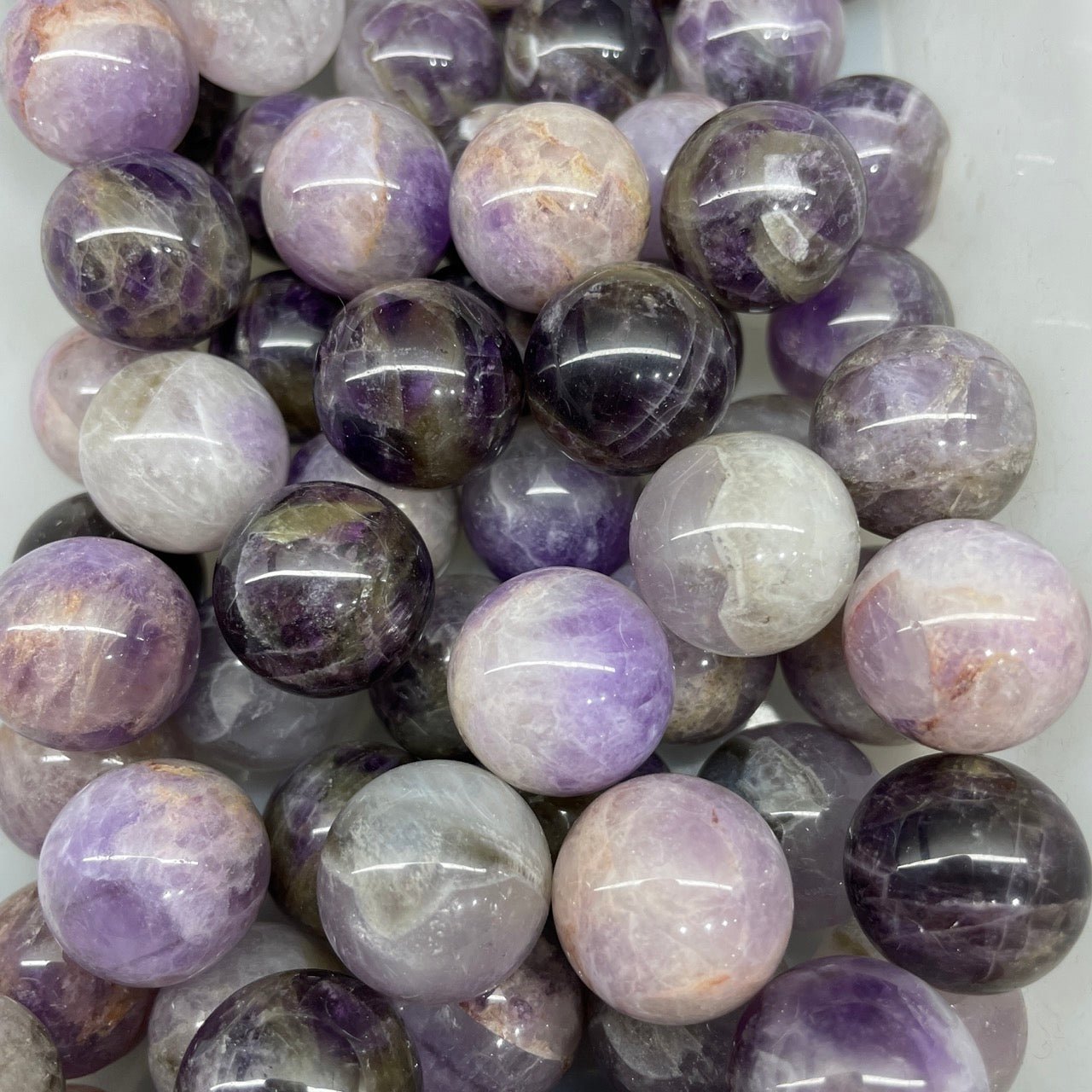 Dream Amethyst Mini Sphere - RockZ Sourcing Hub