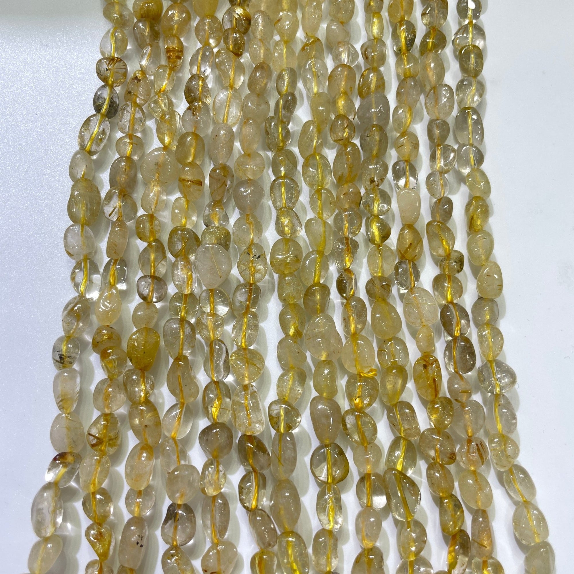 Golden Rutilated Quartz Nugget Bead Strand - RockZ Sourcing Hub