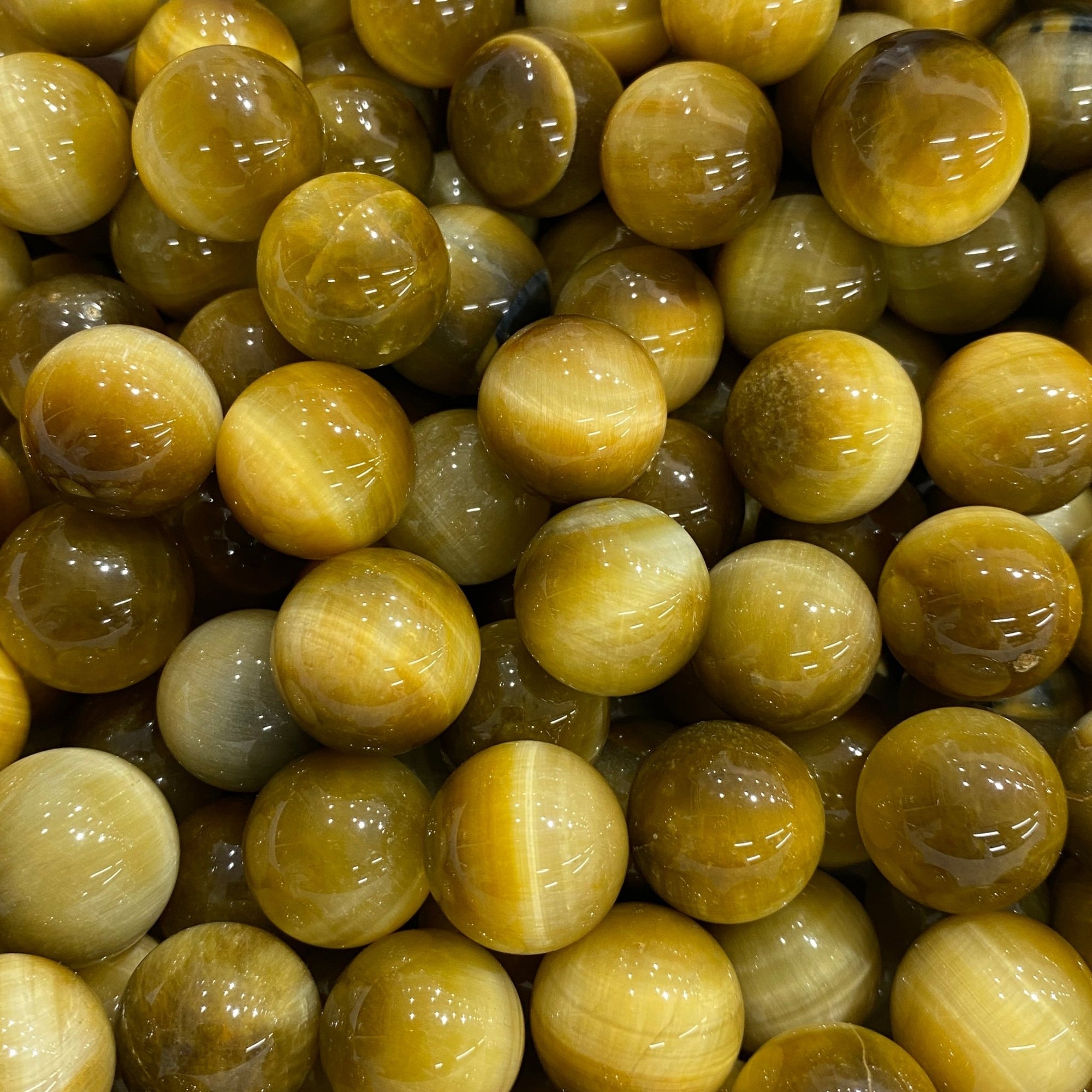 Golden Tiger's Eye Mini Sphere - RockZ Sourcing Hub