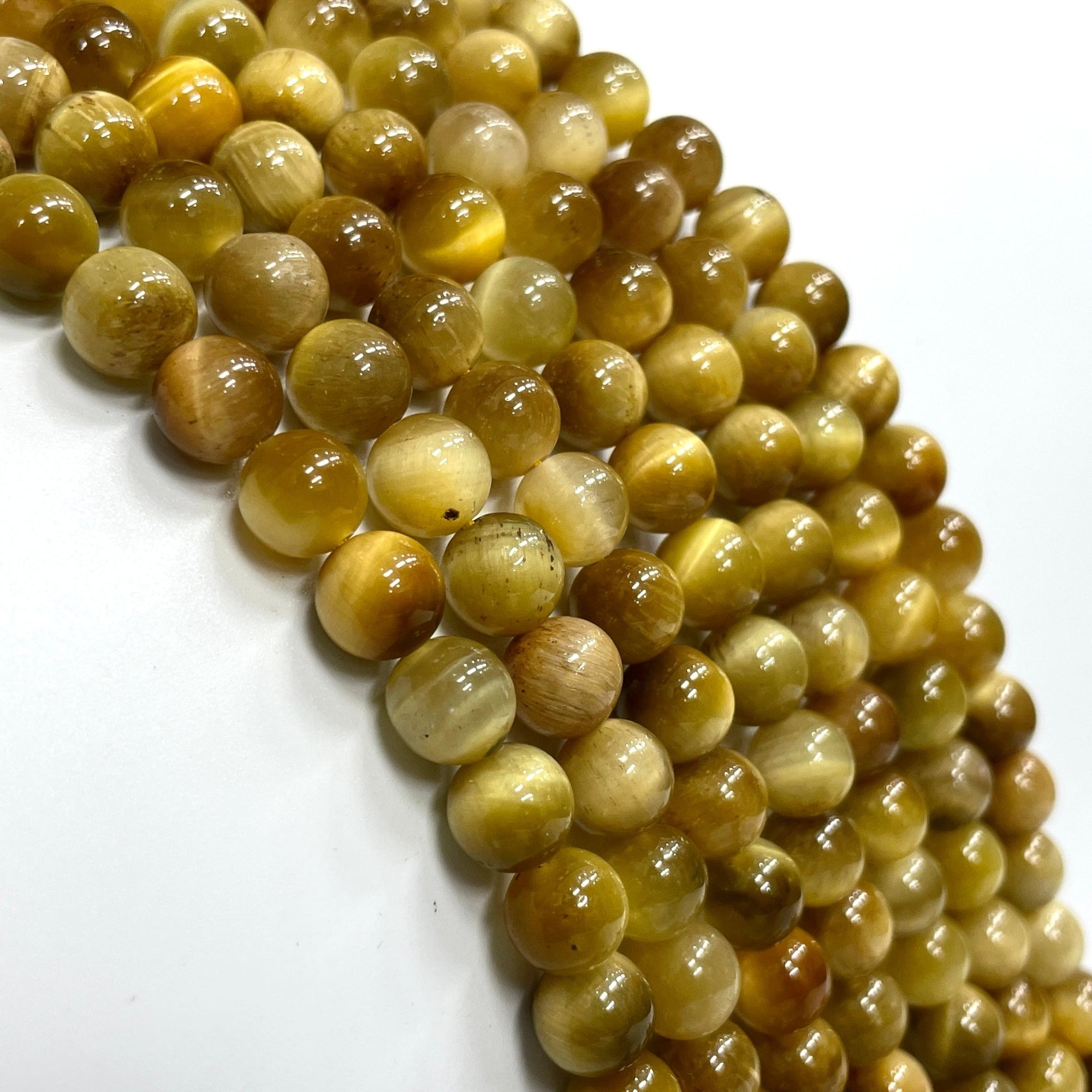 Golden Tiger's Eye Stone Bead Strand - RockZ Sourcing Hub