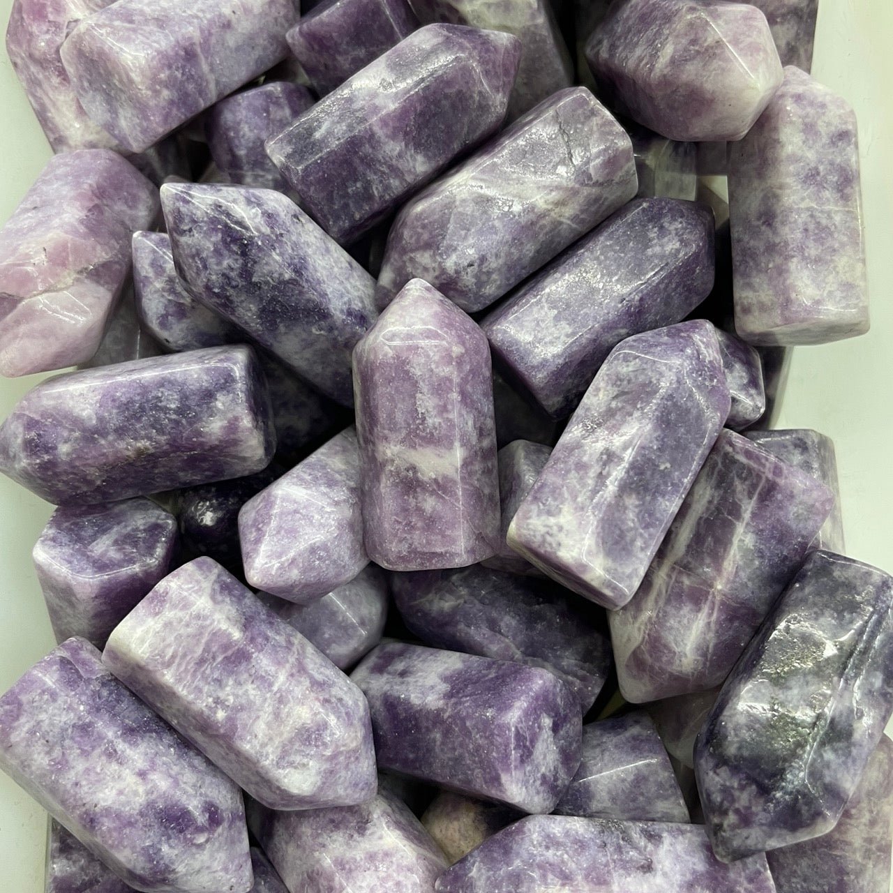 Lepidolite/Purple Mica in Quartz Mini Point - RockZ Sourcing Hub
