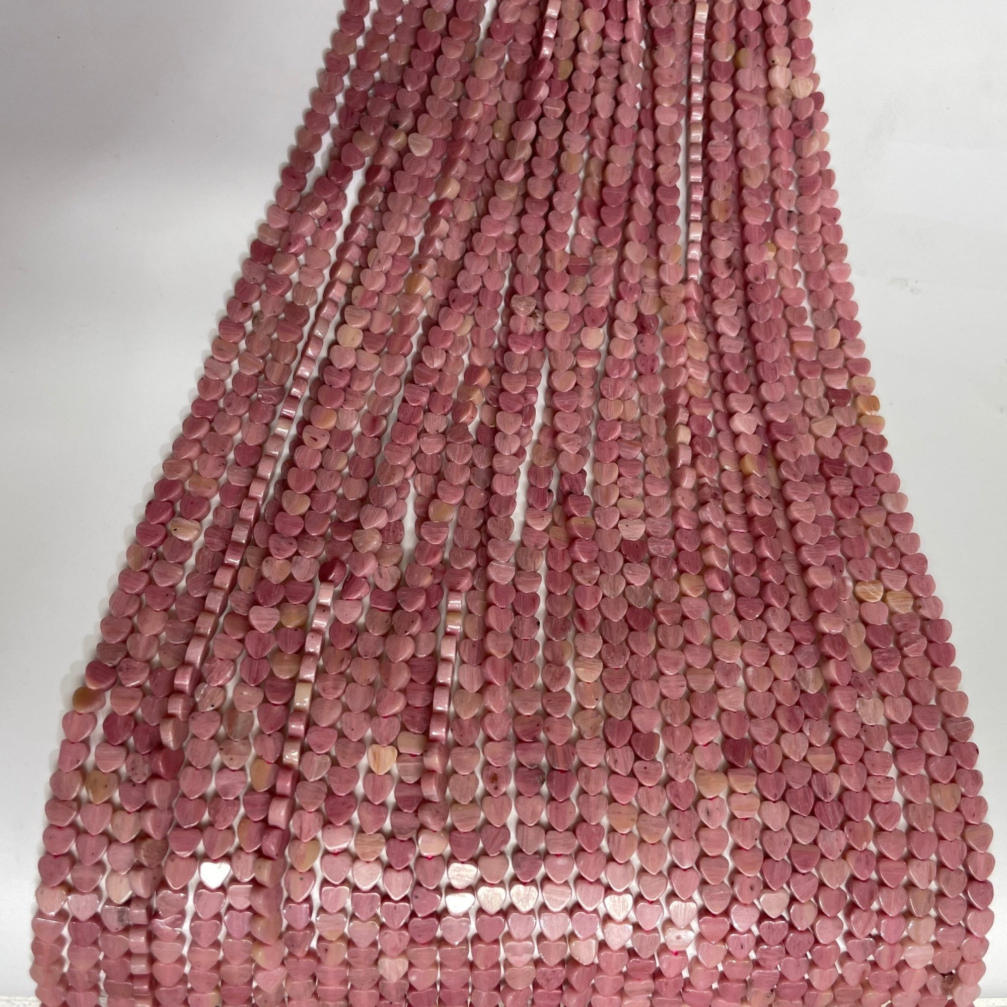 Pink Petrified Wood Double-Sided Flat Heart Shaped Bead Strand - RockZ Sourcing Hub