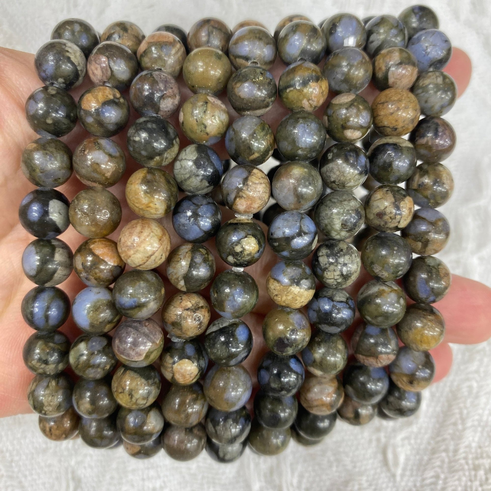 Que Sera/Galaxy Rhyolite Round Bead Stretch Bracelet - RockZ Sourcing Hub