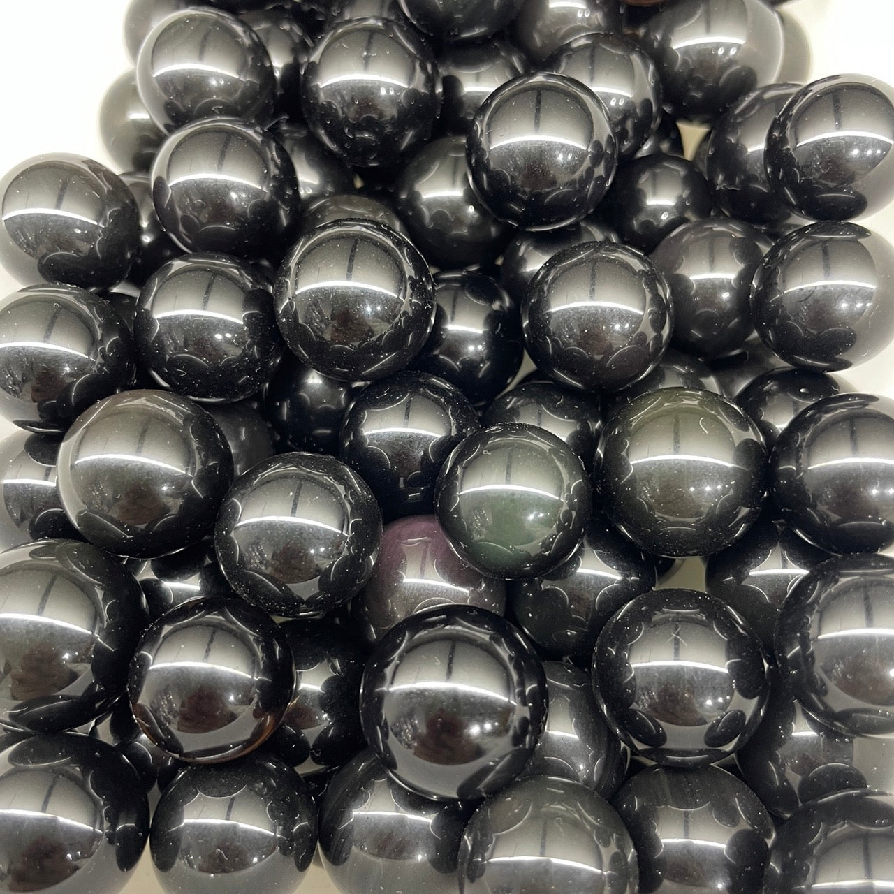 Rainbow Obsidian Mini Sphere - RockZ Sourcing Hub