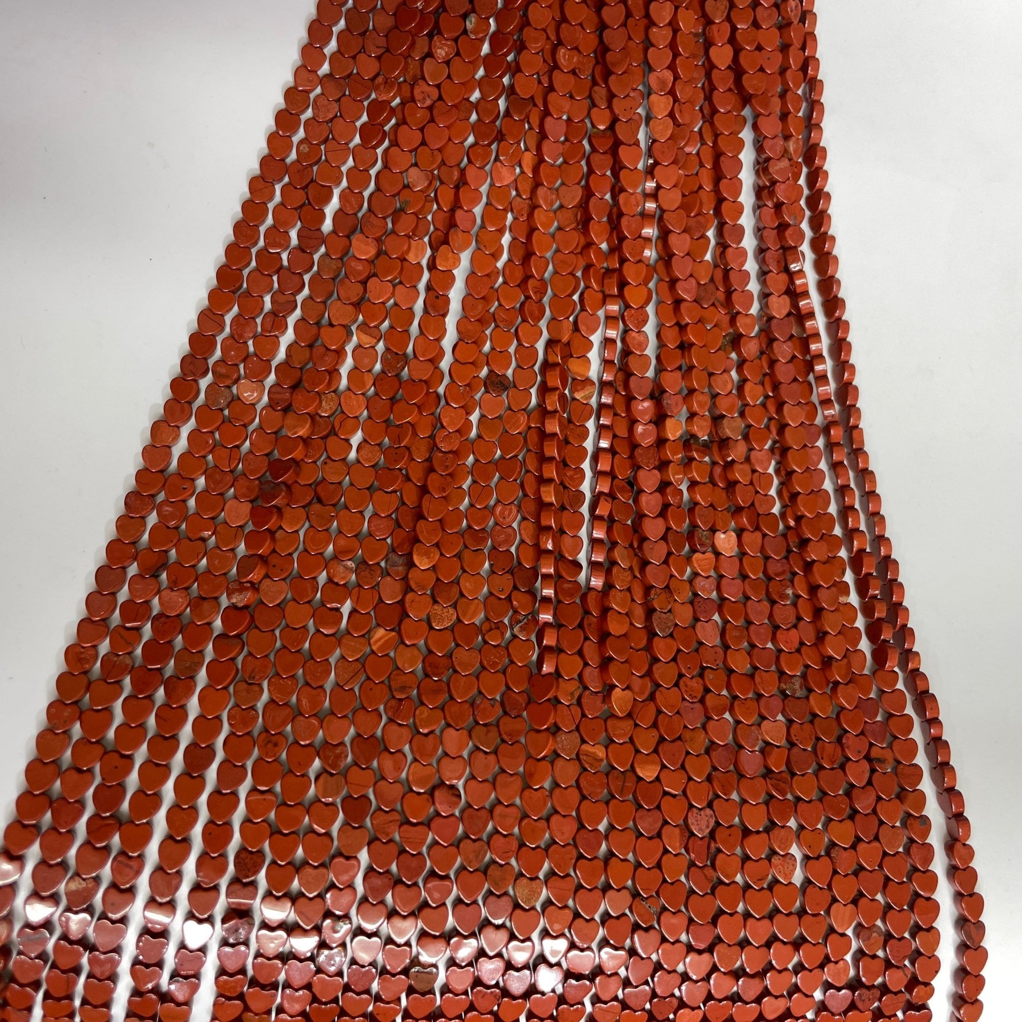 Red Jasper Double-Sided Flat Heart Shaped Bead Strand - RockZ Sourcing Hub