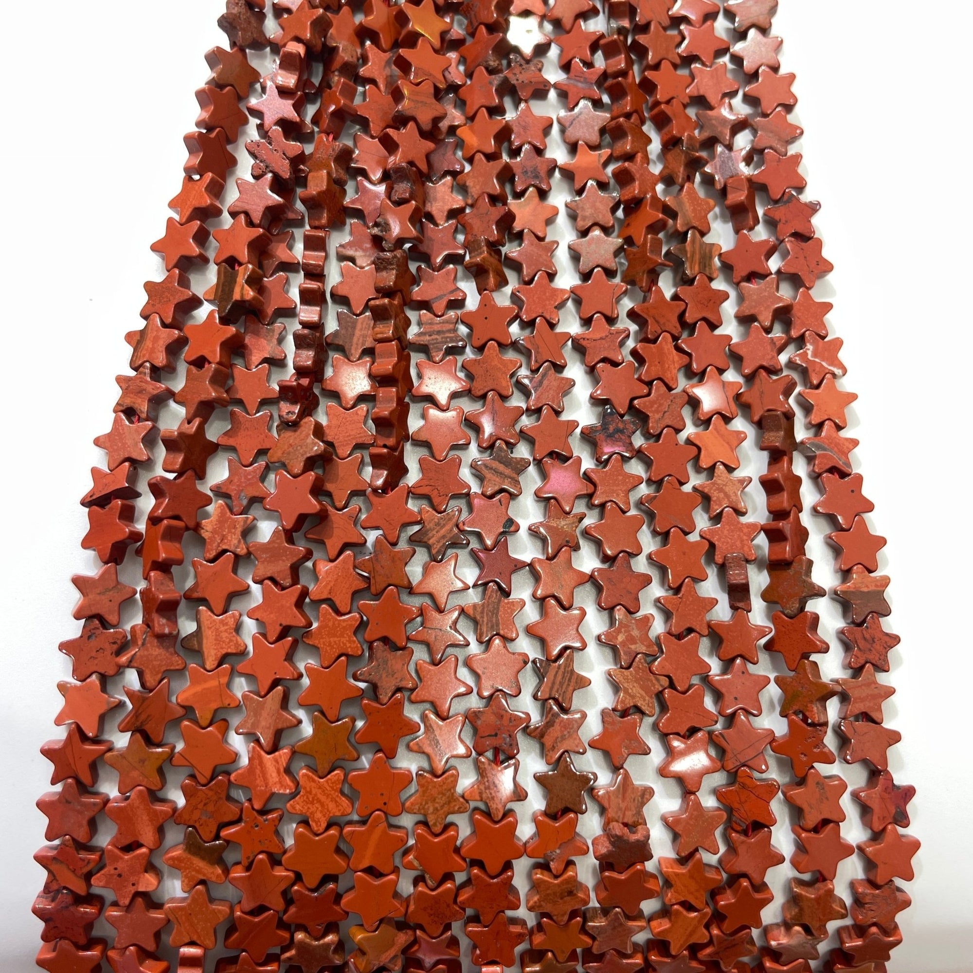 Red Jasper Double-Sided Flat Star Shaped Bead Strand - RockZ Sourcing Hub