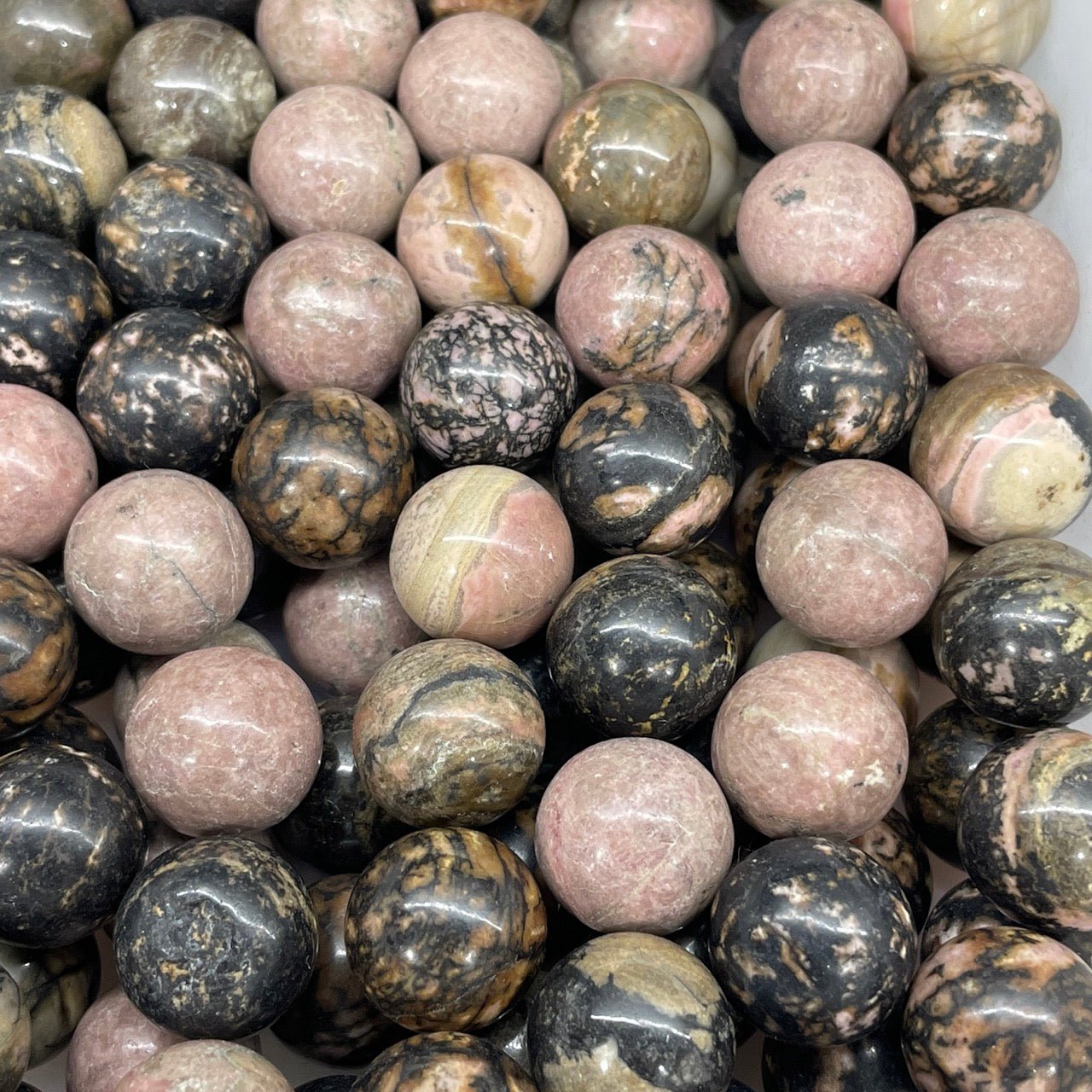 Rhodonite Mini Sphere - RockZ Sourcing Hub