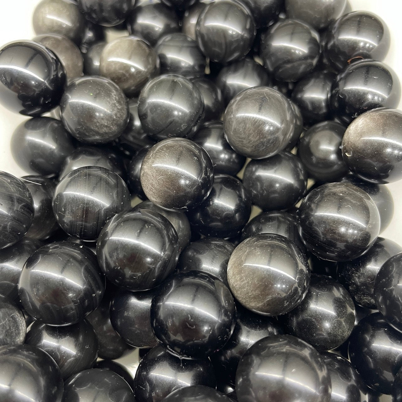 Silver Obsidian Mini Sphere - RockZ Sourcing Hub