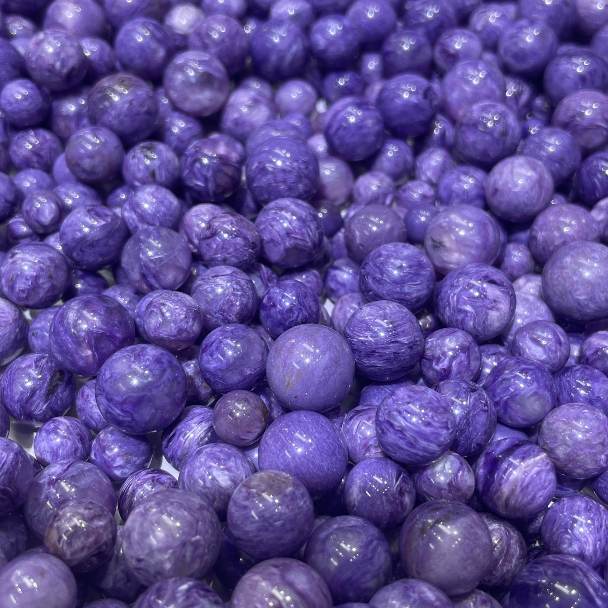 Single Charoite Polished Round Bead – Grade AAA (Drilled / Undrilled) - RockZ Sourcing Hub