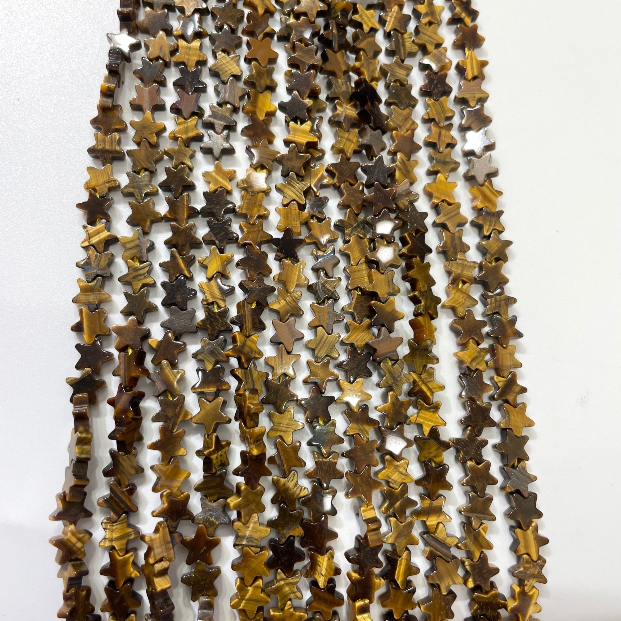 Tiger's Eye Stone Double-Sided Flat Star Shaped Bead Strand - RockZ Sourcing Hub