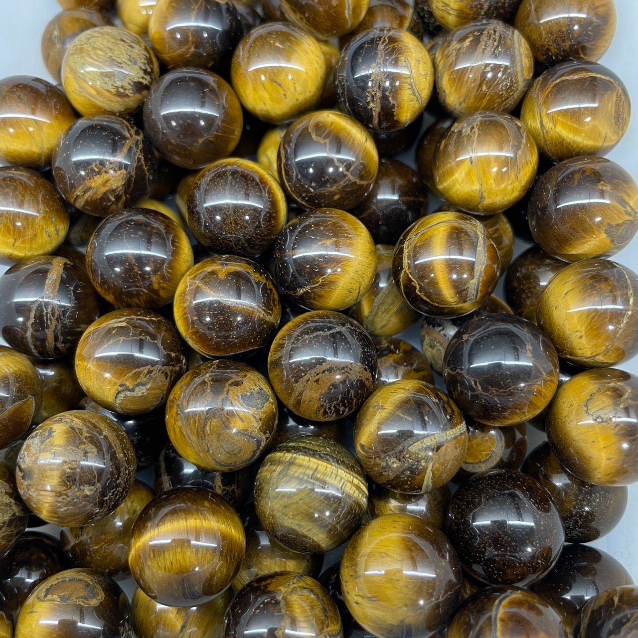 Yellow Tiger's Eye Mini Sphere - RockZ Sourcing Hub